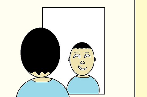 鏡で自分を見る男性